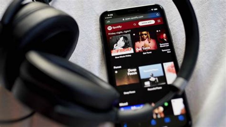How do I download music from YouTube directly to my iPhone?
