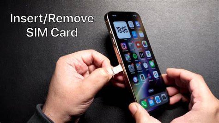How do I open the SIM slot on iPhone 5?