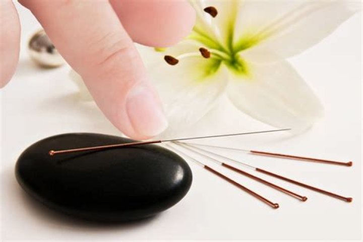 What is MD in acupuncture?